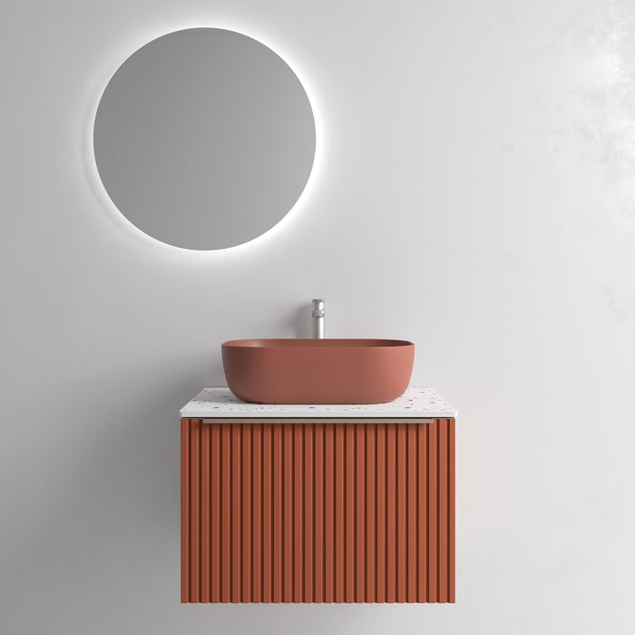 Geribbeld badmeubel in terracotta als warm kleuraccent voor de badkamer kleuren van 2026