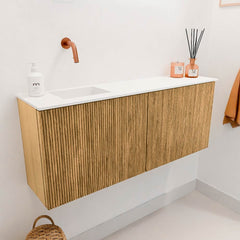 JOYA 100cm toiletmeubel kleur Oak. Wastafel FAYE positie Links Zonder kraangat kleur Talc.