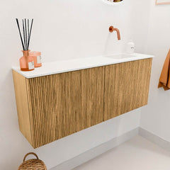 JOYA 100cm toiletmeubel kleur Oak. Wastafel FAYE positie Rechts Zonder kraangat kleur Talc.