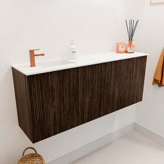 JOYA 100cm toiletmeubel kleur Walnut. Wastafel FAYE positie Links 1 kraangat kleur Talc.