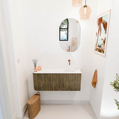 JOYA 101,6cm toiletmeubel ronding links kleur Dusk. Wastafel FAYE positie Rechts Zonder kraangat kleur Talc.