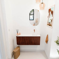 JOYA 101,6cm toiletmeubel ronding links kleur Ruby. Wastafel FAYE positie Rechts Zonder kraangat kleur Talc.