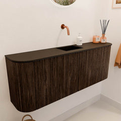 JOYA 113,2cm toiletmeubel ronding links + rechts kleur Walnut. Wastafel FAYE positie Midden Zonder kraangat kleur Urban.