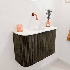 JOYA 63,2cm toiletmeubel ronding links + rechts kleur Shadow. Wastafel FAYE positie Midden Zonder kraangat kleur Talc.