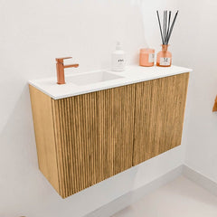 JOYA 70cm toiletmeubel kleur Oak. Wastafel FAYE positie Links 1 kraangat kleur Talc.