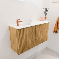 JOYA 81,6cm toiletmeubel ronding rechts kleur Oak. Wastafel FAYE positie Links 1 kraangat kleur Talc.