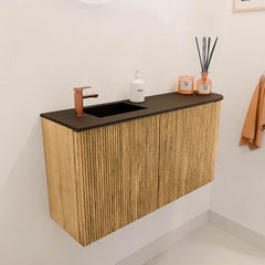 JOYA 81,6cm toiletmeubel ronding rechts kleur Oak. Wastafel FAYE positie Links 1 kraangat kleur Urban.