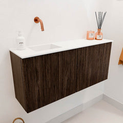 JOYA 90cm toiletmeubel kleur Walnut. Wastafel FAYE positie Links Zonder kraangat kleur Talc.