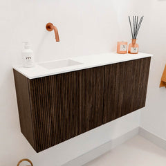 JOYA 90cm toiletmeubel kleur Walnut. Wastafel FAYE positie Links Zonder kraangat kleur Talc.