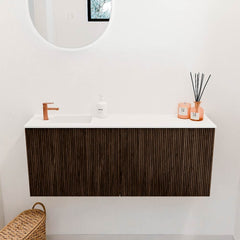JOYA 100cm toiletmeubel kleur Walnut. Wastafel FAYE positie Links 1 kraangat kleur Talc.
