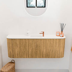 JOYA 113,2cm toiletmeubel ronding links + rechts kleur Oak. Wastafel FAYE positie Midden 1 kraangat kleur Talc.