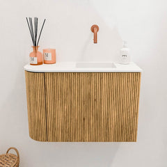 JOYA 61,6cm toiletmeubel ronding links kleur Oak. Wastafel FAYE positie Rechts Zonder kraangat kleur Talc.