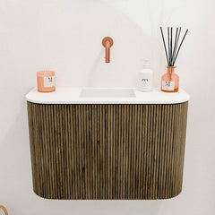 JOYA 63,2cm toiletmeubel ronding links + rechts kleur Dusk. Wastafel FAYE positie Midden Zonder kraangat kleur Talc.