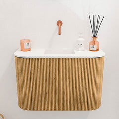 JOYA 63,2cm toiletmeubel ronding links + rechts kleur Oak. Wastafel FAYE positie Midden Zonder kraangat kleur Talc.