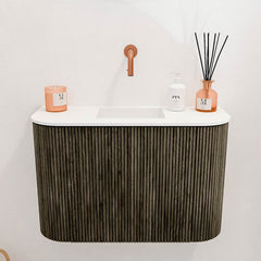 JOYA 63,2cm toiletmeubel ronding links + rechts kleur Shadow. Wastafel FAYE positie Midden Zonder kraangat kleur Talc.