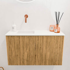 JOYA 70cm toiletmeubel kleur Oak. Wastafel FAYE positie Links Zonder kraangat kleur Talc.