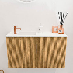 JOYA 70cm toiletmeubel kleur Oak. Wastafel FAYE positie Links 1 kraangat kleur Talc.