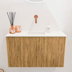 JOYA 70cm toiletmeubel kleur Oak. Wastafel FAYE positie Midden Zonder kraangat kleur Talc.