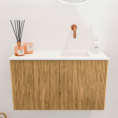 JOYA 70cm toiletmeubel kleur Oak. Wastafel FAYE positie Rechts Zonder kraangat kleur Talc.