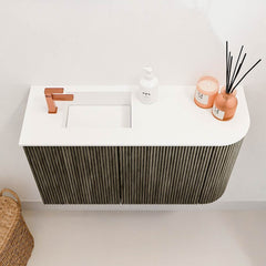 JOYA 71,6cm toiletmeubel ronding rechts kleur Shadow. Wastafel FAYE positie Links 1 kraangat kleur Talc.