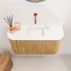 JOYA 73,2cm toiletmeubel ronding links + rechts kleur Oak. Wastafel FAYE positie Midden Zonder kraangat kleur Talc.