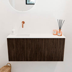 JOYA 90cm toiletmeubel kleur Walnut. Wastafel FAYE positie Links Zonder kraangat kleur Talc.