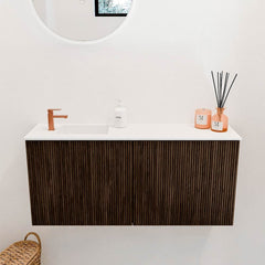 JOYA 90cm toiletmeubel kleur Walnut. Wastafel FAYE positie Links 1 kraangat kleur Talc.