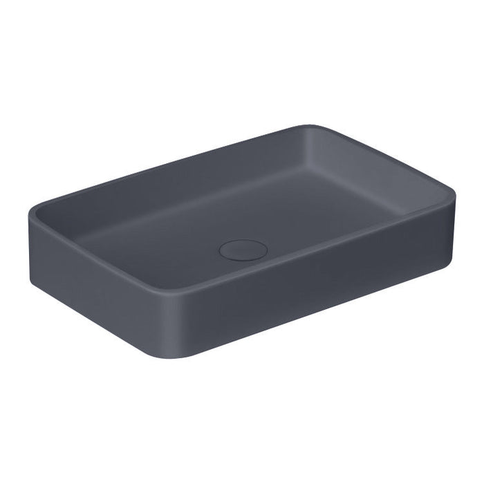 Solid surface opbouw waskom in betongrijs op een badmeubel, een voorbeeld bij de keuze tussen waskom of wastafel