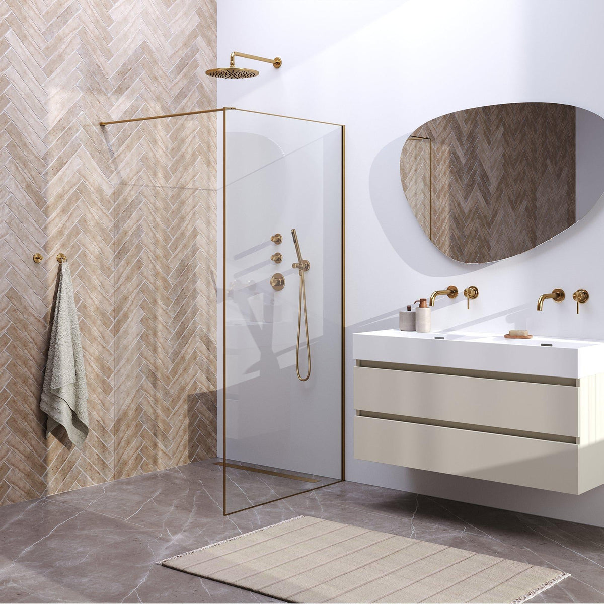 Inloopdouche met geborsteld gouden frame, regendouche en inbouwkraan naast een zwevend badmeubel, een voorbeeld bij het kiezen van een nieuwe douche