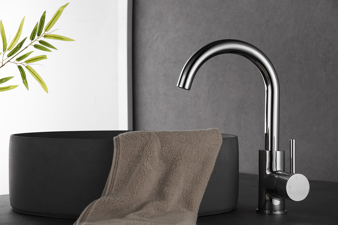 Grooved basin mixer with swivel spout and cold start chrome