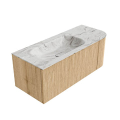 MONDIAZ KURVE-DLUX 115cm badmeubel ronding Rechts kleur Oak met 1 lade en 1 deur. Wastafel BIG SMALL Links 1 kraangat Glace.