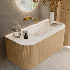 MONDIAZ KURVE-DLUX 100cm badmeubel ronding Links + Rechts kleur Oak met 1 lade en 2 deuren. Wastafel GRUNNE Midden zonder kraangat Frappe.