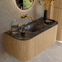 MONDIAZ KURVE-DLUX 100cm badmeubel ronding Links + Rechts kleur Oak met 1 lade en 2 deuren. Wastafel GRUNNE Midden zonder kraangat Lava.