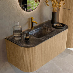 MONDIAZ KURVE-DLUX 100cm badmeubel ronding Links + Rechts kleur Oak met 1 lade en 2 deuren. Wastafel GRUNNE Midden 1 kraangat Lava.