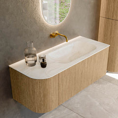 MONDIAZ KURVE-DLUX 115cm badmeubel ronding Links kleur Oak met 1 lade en 1 deur. Wastafel BIG SMALL Rechts zonder kraangat Ostra.