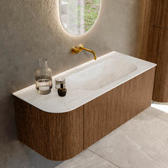 MONDIAZ KURVE-DLUX 115cm badmeubel ronding Links kleur Walnut met 1 lade en 1 deur. Wastafel BIG SMALL Rechts zonder kraangat Ostra.