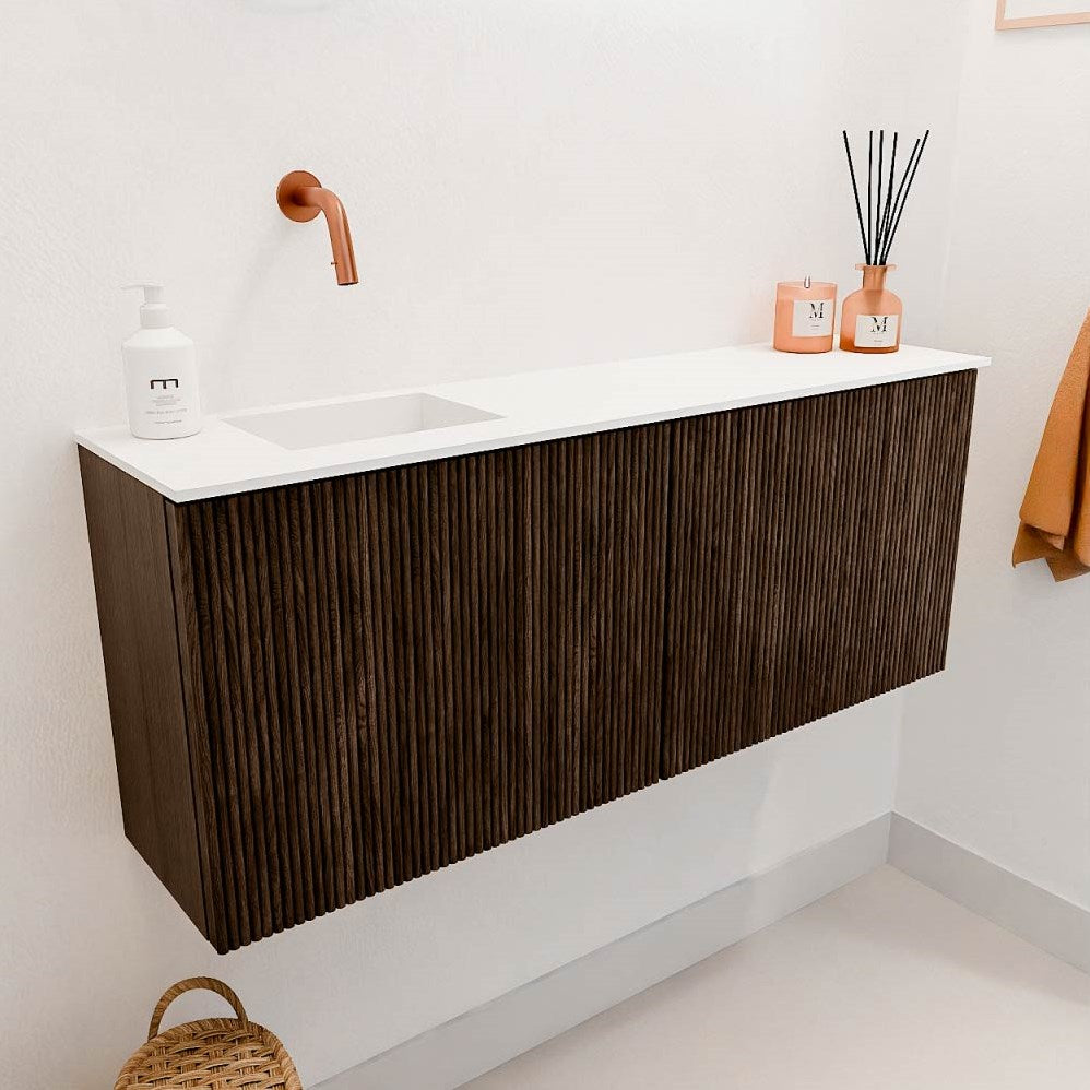 JOYA 100cm toiletmeubel kleur Walnut. Wastafel FAYE positie Links Zonder kraangat kleur Talc.