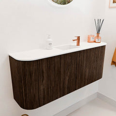 JOYA 103,2cm toiletmeubel ronding links + rechts kleur Walnut. Wastafel FAYE positie Midden 1 kraangat kleur Talc.