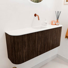 JOYA 103,2cm toiletmeubel ronding links + rechts kleur Walnut. Wastafel FAYE positie Midden Zonder kraangat kleur Talc.
