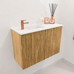 JOYA 60cm toiletmeubel kleur Oak. Wastafel FAYE positie Links 1 kraangat kleur Talc.