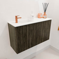 JOYA 70cm toiletmeubel kleur Shadow. Wastafel FAYE positie Links 1 kraangat kleur Talc.