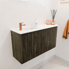 JOYA 81,6cm toiletmeubel ronding rechts kleur Shadow. Wastafel FAYE positie Links 1 kraangat kleur Talc.